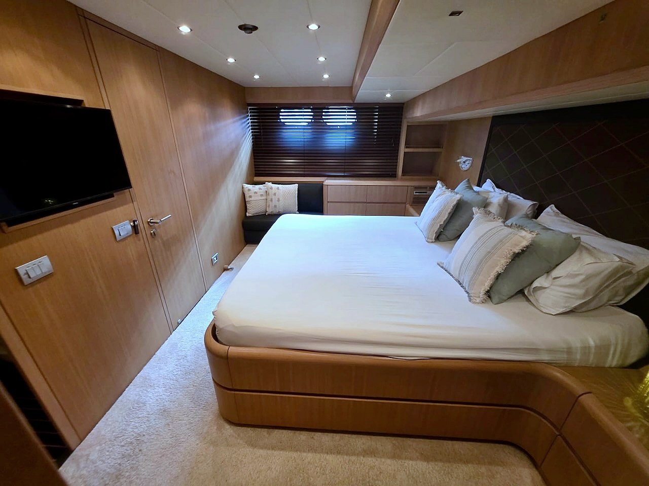 Spacious master cabin aboard the Limitless yacht
