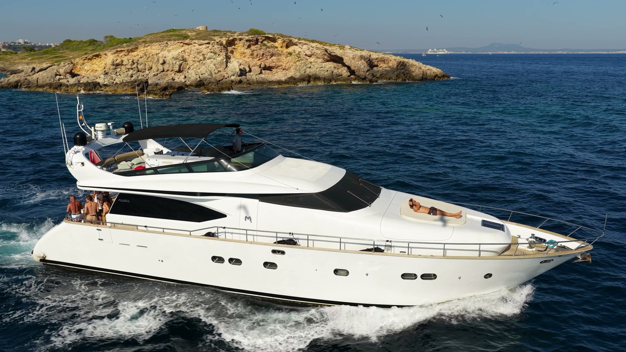 Guests on the sun deck as Limitless cruises the Mallorca coast