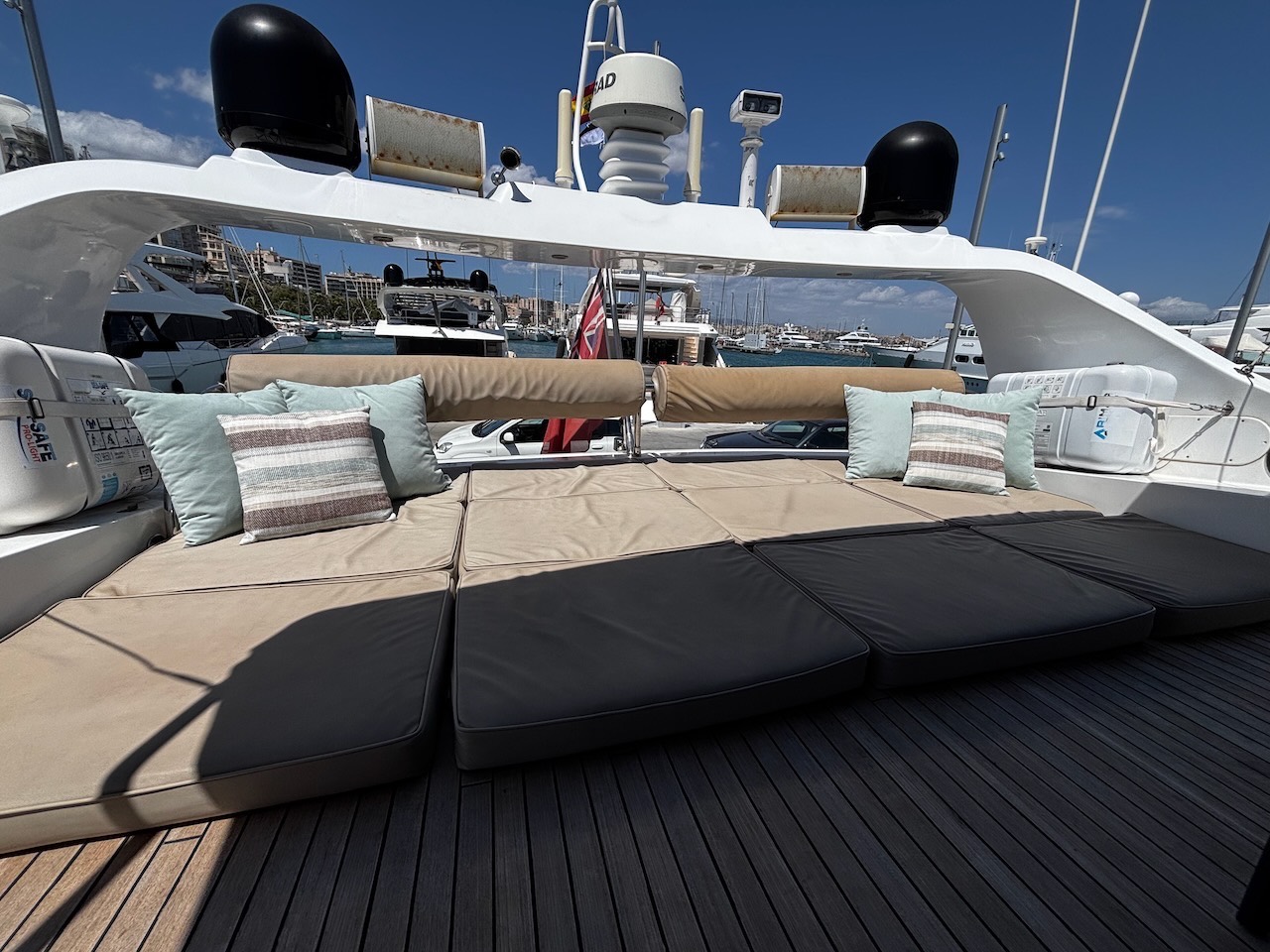 Flybridge sun deck and sunpads on the Limitless yacht