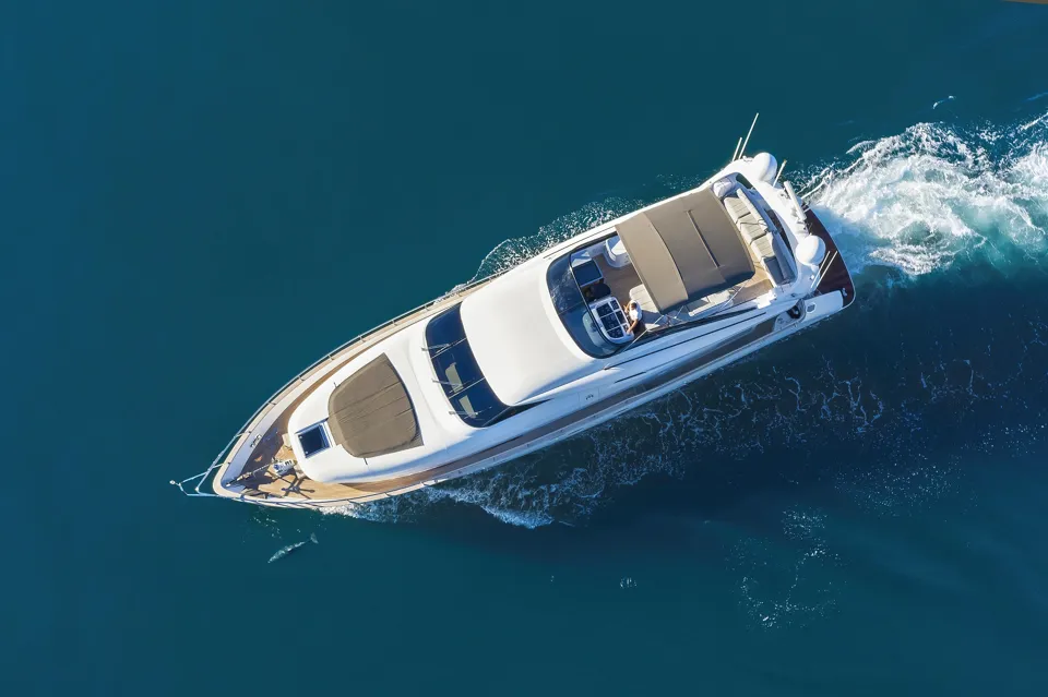 Limitless Maiora yacht anchored off a Mallorca cove